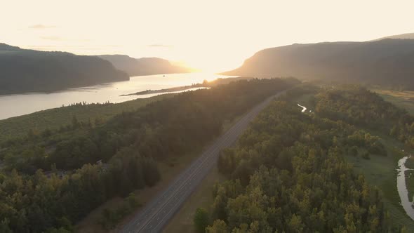 Beautiful Aerial View of Columbia River during a vibrant summer sunrise. Taken in Oregon, United Sta