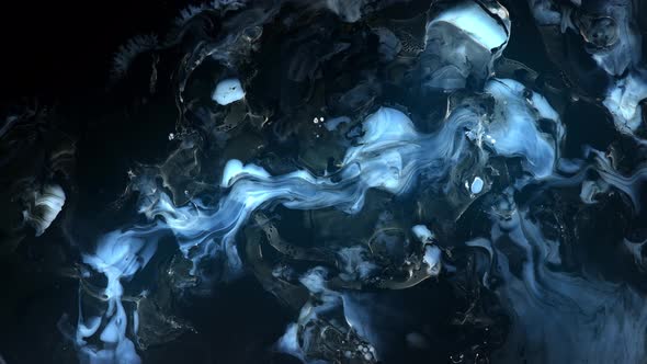 Dark Black and White Macro Paint Particles And Glossy Drops Bursting On Otherworldly Terrain