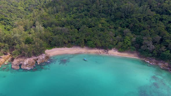 Banana Beach Phuket Thailand White Sandy Beach with Palm Trees View From Drone Aerial View at Beach