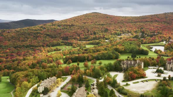 Killington Mountain Resort at Colorful Red Orange Fall Foliage Forest Landscape