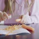 Girl peeling carrot - VideoHive Item for Sale