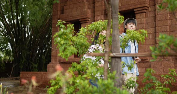 Couple hand together while visiting at ancient temple