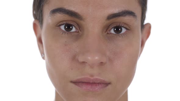 Close Up of Serious Latin Girl Face White Background