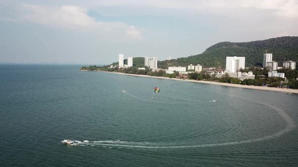 Parasail boat with colorful parachute 