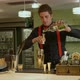 Bartender preparing cocktails for couple at bar counter, Alta Badia, Italy - VideoHive Item for Sale