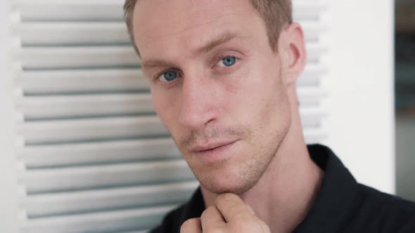 Portrait of Blue-eyed Handsome Blond Man, Looking at Camera,posing