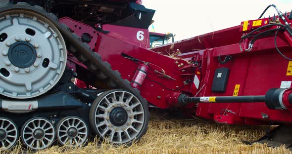 Heavy Machinery on Wheat Field Big Combine Harvester Operating Film Grain