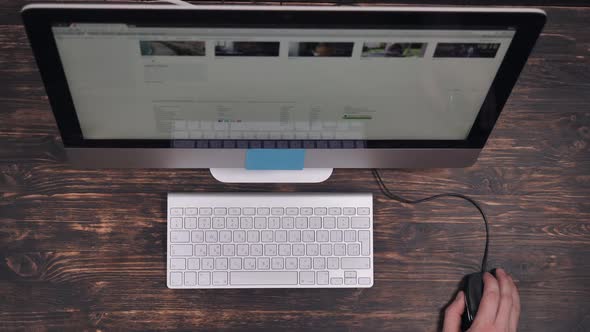 Person Works on Computer Using Wireless