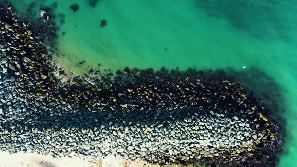 Top down aerial turquoise beach view