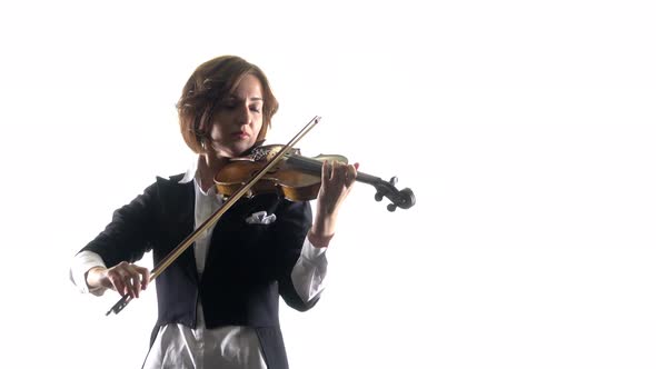 Violinist Plays a Lyrical Work. White Background