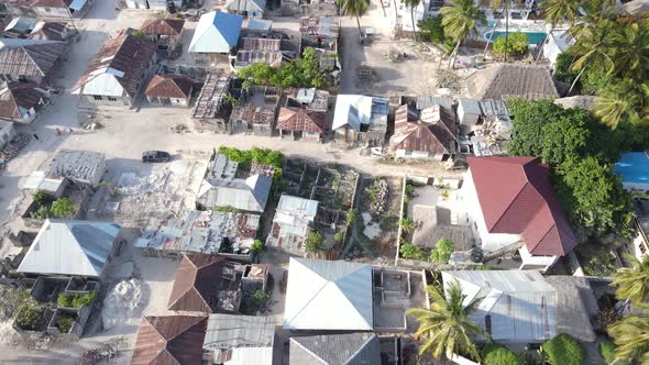 Aerial View of Houses Near the Coast in Zanzibar Tanzania Slow Motion