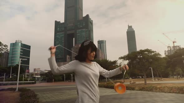 Taiwanese woman playing with a Chinese Yo-Yo