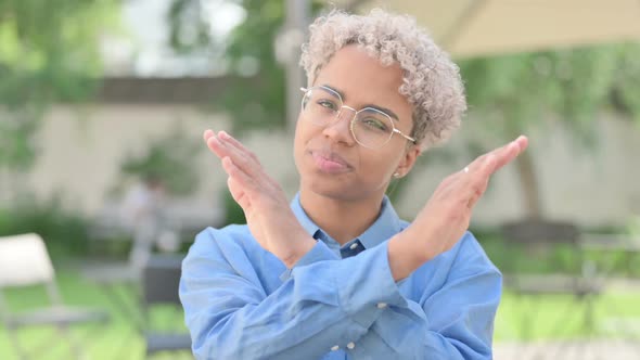 Portrait of No Sign By Young African Woman By Arm Gesture