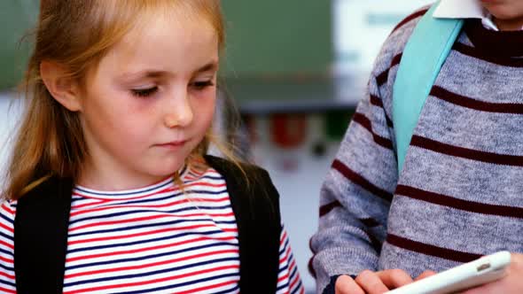 School kids using digital tablet