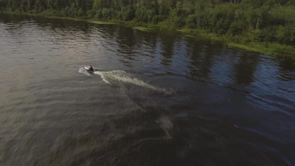 Teen Boy on the Jet Ski in the River