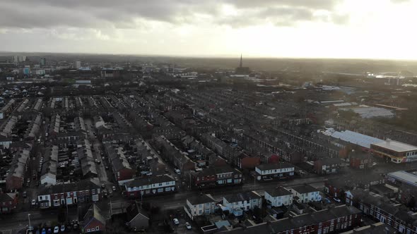 Church of St Walburge, Preston in the distance against the bright morning sun