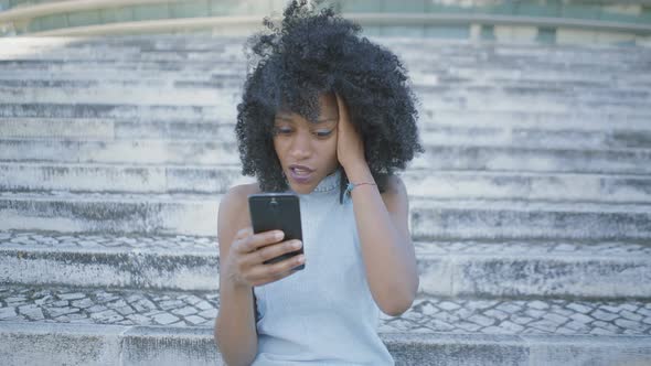 Pretty Woman Googling on Phone, Looking Surprised, Not Believing