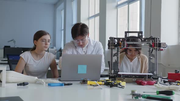 Teacher Shows How to Connect Laptop with the 3D Printer