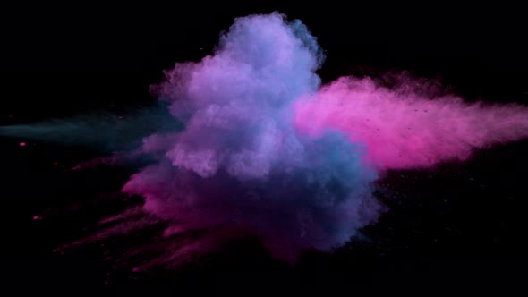 Super Slowmotion Shot of Color Powder Explosion Isolated on Black Background