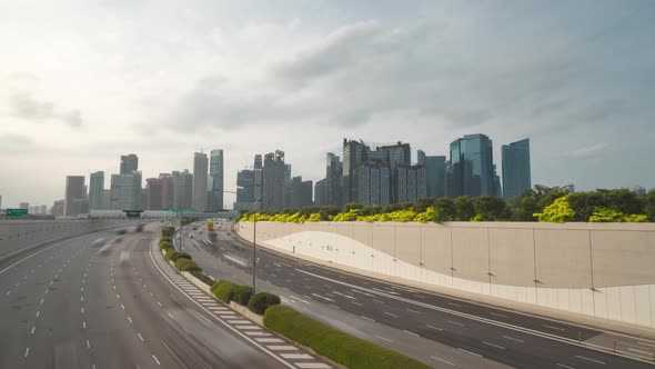 Traffic view with background Singapore landmark financial business district with skyscraper,