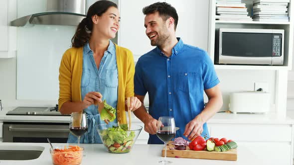 Couple preparing food together in the kitchen