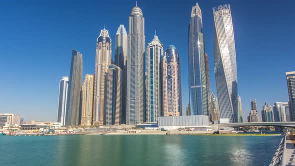 Scenic View of Dubai Marina Skyscrapers with Boats Timelapse Skyline View From Sea United Arab