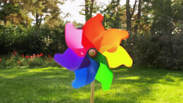 Colorful Pinwheel Rotating Outdoors in Summer