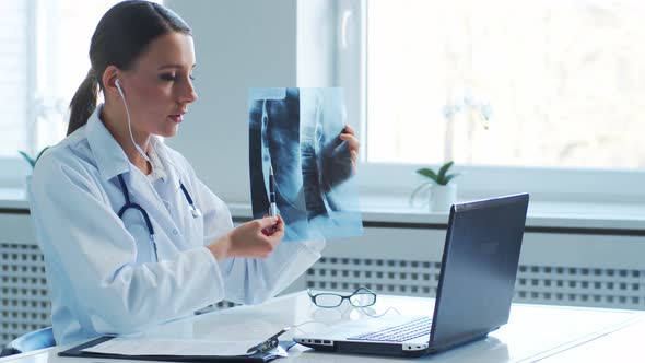 Professional medical doctors working in hospital office making research.