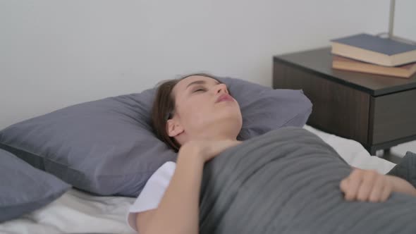 Woman Waking Up From Nightmare in Bed