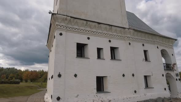 Countryside landscape with an old white tower