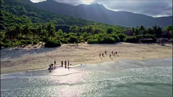 Aerial View People Search on Edge of Ocean Wave Surf