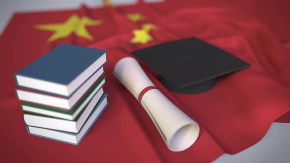 Graduation Cap and Diploma on Flag of China alt