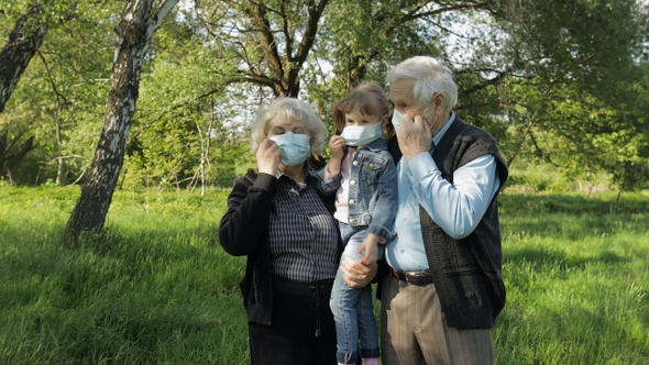 Family of Grandparents Takes Off Medical Masks After Coronavirus Quarantine End