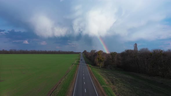 Rainbow Over Rural Highway Road Spring Landscape Aerial View