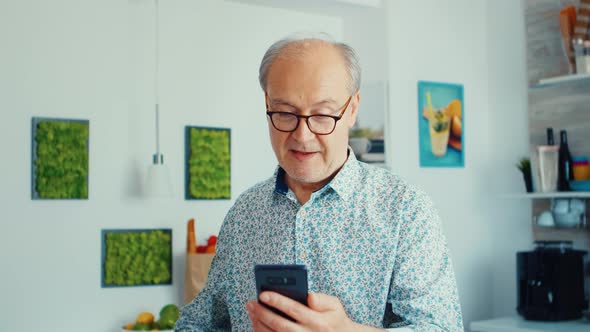 Grandfather Enjoying Music