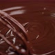 Stirring melted liquid chocolate with steel whisk - VideoHive Item for Sale