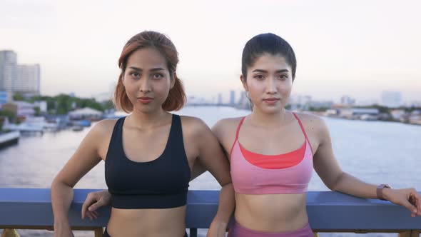 Female Fitness Trainer and Athlete at City Bridge