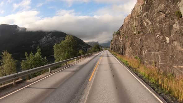 Vehicle Pointofview Driving a Car on a Road in Norway