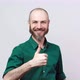 Happy bearded man in shirt showing thumbs sign up over white background. Good job - VideoHive Item for Sale
