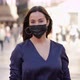 Woman in Mask Standing on Street - VideoHive Item for Sale