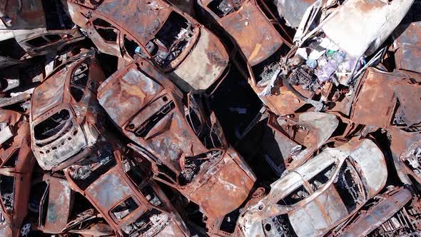 Vertical Video of a Dump of Cars Destroyed By the War in Ukraine