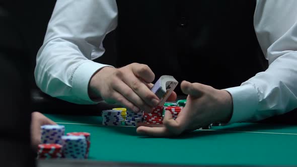 Poker Dealer Masterfully Shuffling Cards, Casino Entertainment Business, Slow-Mo