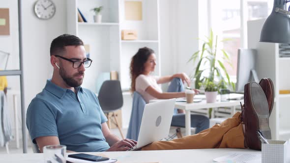 Caucasian Bearded Businessman Working on Computer