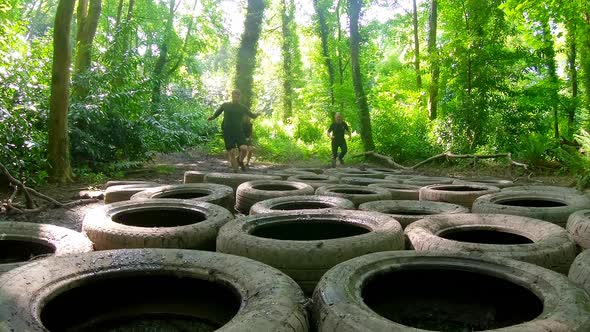 Fit mens training over tyres obstacle course 4k