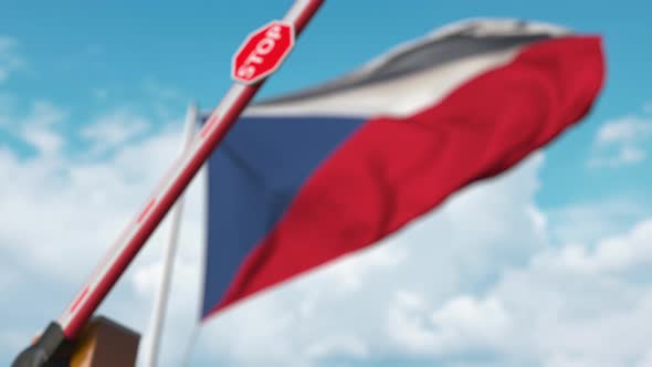 Closing Boom Barrier with Stop Sign Against the Czech Flag alt