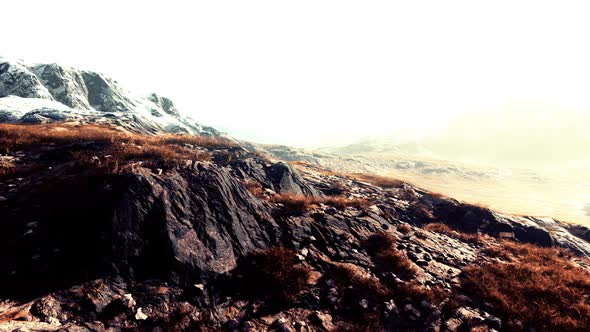 Lanscape with Barren Mountain Which is Covered with Ice