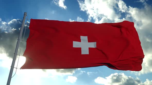 National Flag Switzerland Flutters Wind Against Blue Sky