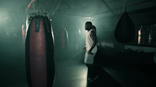 Male Boxer in boxing Club Skipping