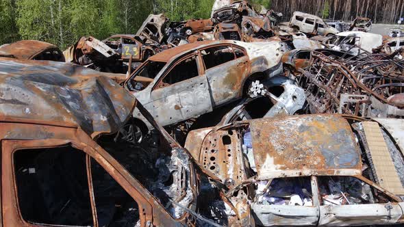 Consequences of the War in Ukraine  a Dump of Shot and Burned Cars in the City of Irpen Near Kyiv