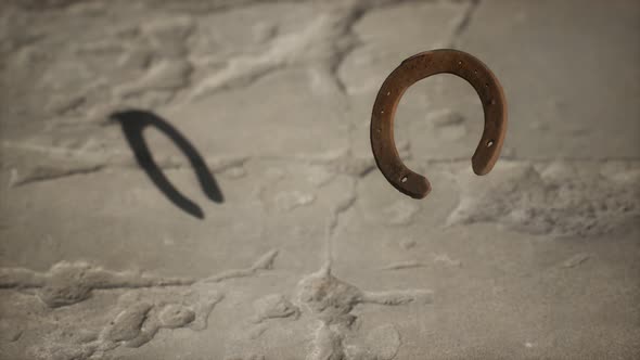 Extreme Slow Motion Old Rusty Metal Horseshoe